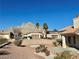 Landscaped backyard with desert plants and a mountain view at 11037 Hawk Valley Ave, Las Vegas, NV 89134