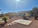 View of backyard with neighboring houses and gazebo at 11037 Hawk Valley Ave, Las Vegas, NV 89134