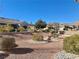 Landscaped backyard with gravel and rock border at 11037 Hawk Valley Ave, Las Vegas, NV 89134