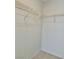 Walk-in closet with white wire shelving for organized storage at 11037 Hawk Valley Ave, Las Vegas, NV 89134