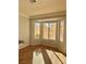 Dining area with abundant natural light and laminate flooring at 11037 Hawk Valley Ave, Las Vegas, NV 89134