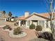 Single story home with landscaped yard and patio at 11037 Hawk Valley Ave, Las Vegas, NV 89134