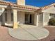 A covered patio with desert landscaping providing a serene outdoor living space at 11037 Hawk Valley Ave, Las Vegas, NV 89134