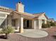 A covered patio with desert landscaping providing a serene outdoor living space at 11037 Hawk Valley Ave, Las Vegas, NV 89134