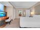 Bright bedroom with king bed, workspace, and en-suite bathroom at 145 E Harmon Ave # 2321, Las Vegas, NV 89109