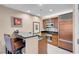 Well-equipped kitchen featuring wood cabinets and stainless steel appliances at 145 E Harmon Ave # 2321, Las Vegas, NV 89109