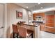 Modern kitchen with wood cabinetry, granite countertops and breakfast bar at 145 E Harmon Ave # 2321, Las Vegas, NV 89109