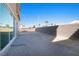 Spacious backyard with block wall and gravel at 1722 Game Garden Rd, North Las Vegas, NV 89031