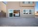 View of backyard with sliding glass doors leading to kitchen at 1722 Game Garden Rd, North Las Vegas, NV 89031