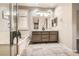 Bathroom featuring double sinks, granite countertops, shower and bathtub at 3005 Noblesville Ct, Henderson, NV 89052