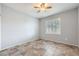 Bedroom features neutral colored walls, a ceiling fan and decorative tile flooring at 3005 Noblesville Ct, Henderson, NV 89052