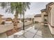 Exterior view from the patio featuring lush landscaping around the corner of the house at 3005 Noblesville Ct, Henderson, NV 89052