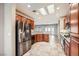 Modern kitchen featuring stainless steel appliances, granite countertops, and ample cabinet space at 3005 Noblesville Ct, Henderson, NV 89052