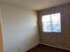 Bright bedroom featuring patterned wallpaper and a window at 427 E Barrett St, Henderson, NV 89011