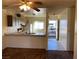 Kitchen with wood cabinets, stove, and kitchen island at 427 E Barrett St, Henderson, NV 89011