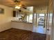 Kitchen with wood cabinets, stove, and kitchen island at 427 E Barrett St, Henderson, NV 89011