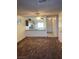 Kitchen with breakfast bar and view into living room at 427 E Barrett St, Henderson, NV 89011