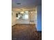 Kitchen with breakfast bar and view into living room at 427 E Barrett St, Henderson, NV 89011