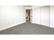 Bedroom with carpet, closet and hallway access at 686 Ribbon Grass Ave, Las Vegas, NV 89183