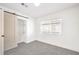 Well-lit bedroom with window and built-in closet at 686 Ribbon Grass Ave, Las Vegas, NV 89183