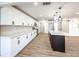 Spacious kitchen with stainless steel appliances and white cabinetry at 686 Ribbon Grass Ave, Las Vegas, NV 89183