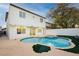 Freeform pool and spa with a large patio area at 686 Ribbon Grass Ave, Las Vegas, NV 89183