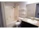 Clean bathroom featuring a shower/tub combo and granite vanity at 7563 Durham Hall Ave # 101, Las Vegas, NV 89130