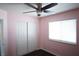 Spacious bedroom with double door closet and ceiling fan at 7563 Durham Hall Ave # 101, Las Vegas, NV 89130