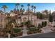 Stunning two-story home with palm trees and landscaping at 8109 Moonstone Cir, Las Vegas, NV 89128