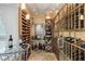 Extensive wine cellar with glass-front storage and ample space at 8109 Moonstone Cir, Las Vegas, NV 89128