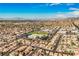 Wide aerial view of community and school at 841 Glitter Glen Ct, Las Vegas, NV 89123