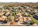 Aerial view of house and neighborhood, showcasing mountain views at 841 Glitter Glen Ct, Las Vegas, NV 89123