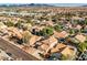 Aerial view of house and neighborhood, showcasing mountain views at 841 Glitter Glen Ct, Las Vegas, NV 89123