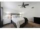 Bright bedroom with king bed, ceiling fan, and ample light at 841 Glitter Glen Ct, Las Vegas, NV 89123