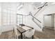 Open concept dining area with a view of the staircase at 841 Glitter Glen Ct, Las Vegas, NV 89123