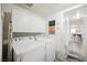 Laundry room with washer, dryer, and cabinets at 841 Glitter Glen Ct, Las Vegas, NV 89123