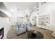 Living area with a view of the dining room and staircase at 841 Glitter Glen Ct, Las Vegas, NV 89123