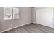 Spare bedroom with gray flooring and double door closet at 900 Heavenly Hills Ct # 217, Las Vegas, NV 89145