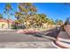 Gated entrance to the community with parking area at 900 Heavenly Hills Ct # 217, Las Vegas, NV 89145