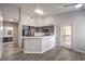 Kitchen with gray cabinets, white countertops, and black appliances at 900 Heavenly Hills Ct # 217, Las Vegas, NV 89145