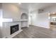 Living room with fireplace and gray vinyl flooring at 900 Heavenly Hills Ct # 217, Las Vegas, NV 89145