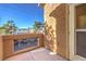 Private patio with partial view of mountains in distance at 900 Heavenly Hills Ct # 217, Las Vegas, NV 89145