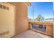 Private patio with a view of the surrounding area at 900 Heavenly Hills Ct # 217, Las Vegas, NV 89145