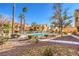 Community pool with surrounding landscaping and patio areas at 900 Heavenly Hills Ct # 217, Las Vegas, NV 89145