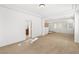 Bright living room with neutral carpet, natural light and an open floor plan at 10929 Mount Royal Ave, Las Vegas, NV 89144