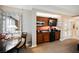 Cozy kitchenette features stainless steel microwave, cooktop, sink and mini-fridge, perfect for simple meals and refreshments at 135 E Harmon Ave # 407, Las Vegas, NV 89109