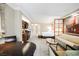Open-concept living area with kitchen, bedroom, seating, and contemporary furnishings at 135 E Harmon Ave # 407, Las Vegas, NV 89109