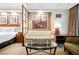 Comfortable living room features a cozy sofa, modern art, and a stylish glass table at 135 E Harmon Ave # 407, Las Vegas, NV 89109