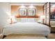Hotel suite featuring a king-sized bed with accent lighting and seating at 135 E Harmon Ave # 407, Las Vegas, NV 89109