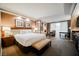 Hotel suite featuring a king-size bed and a refreshment bar with a small sink and countertop at 135 E Harmon Ave # 407, Las Vegas, NV 89109